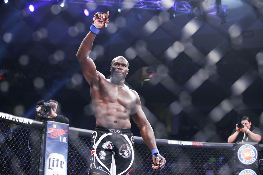 Cheick Kongo celebrating victory in the Bellator cage